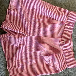 Ajustable attached belt shorts with red-ish magenta and white stripes sizeMedium